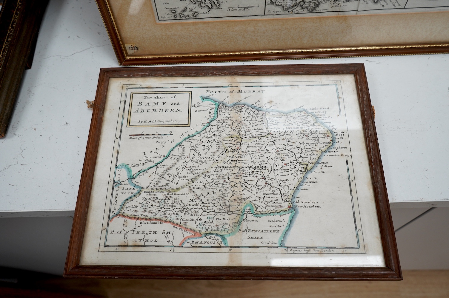 Two engraved maps comprising R. Morden (1650-1703), Smaller Islands in the British Ocean, and H. Moll (1654-1732), Bamf and Aberdeen, 37 x 43cm. Condition - fair, discolouration